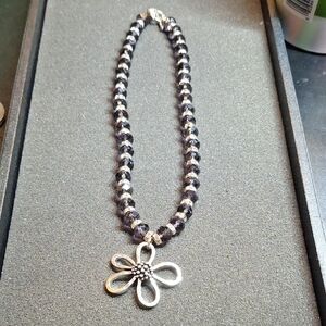 Silver Flower Pendant Necklace with Purple Faceted Beads